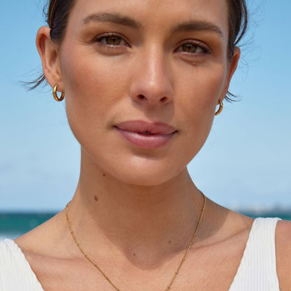 Bold Chunky Huggie Hoop Earrings, 18K Gold Stainless Steel, Waterproof - Mari Gavane